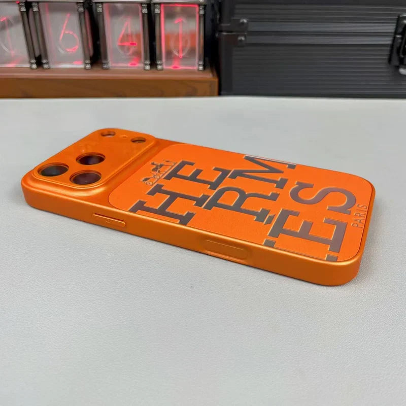 Premium orange leather iPhone case with bold designer typography