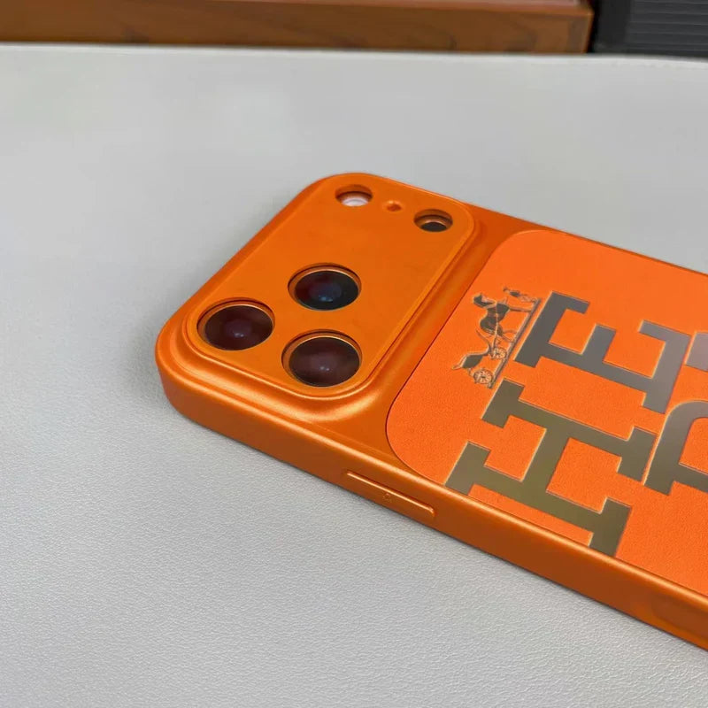 Premium orange leather iPhone case with bold designer typography