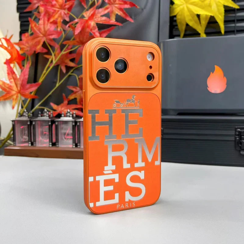 Premium orange leather iPhone case with bold designer typography